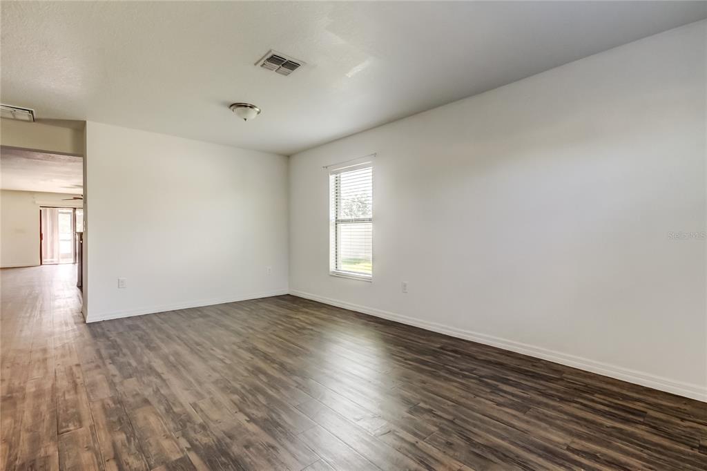 flex room towards kitchen/great room area in background