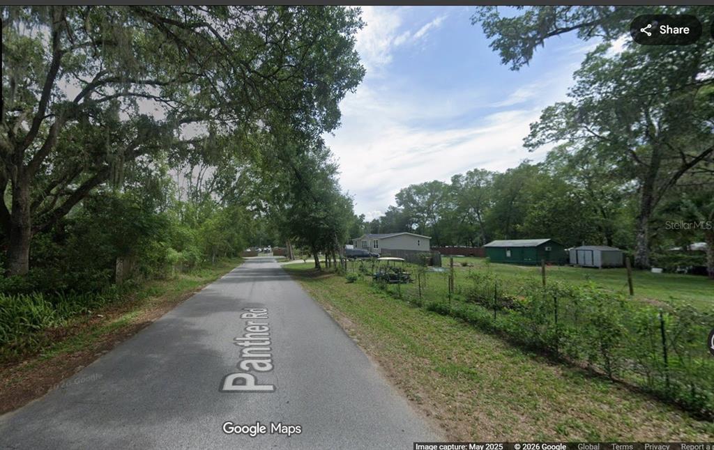 Road entering the neighborhood