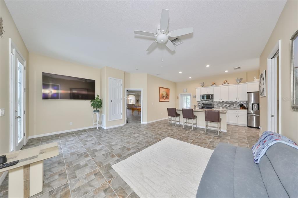 Additional living & bedroom at rear of home w/ full kitchen