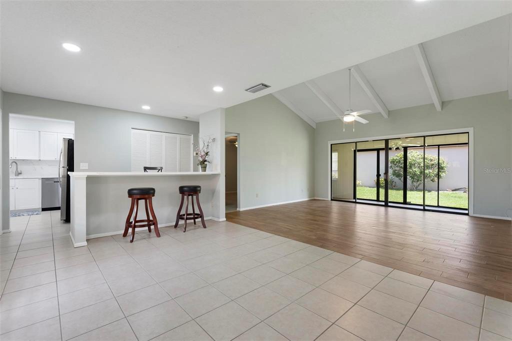 OPEN FLOOR PLAN WITH VAULTED CEILINGS IN GREAT ROOM