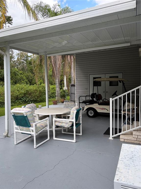 Covered Porch facing woods with access from house