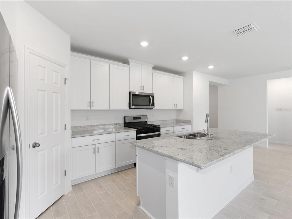 Photo is not of the actual home, but is an inspirational photo of builder’s model home and may depict options, furnishings, and/or decorator features that are not included