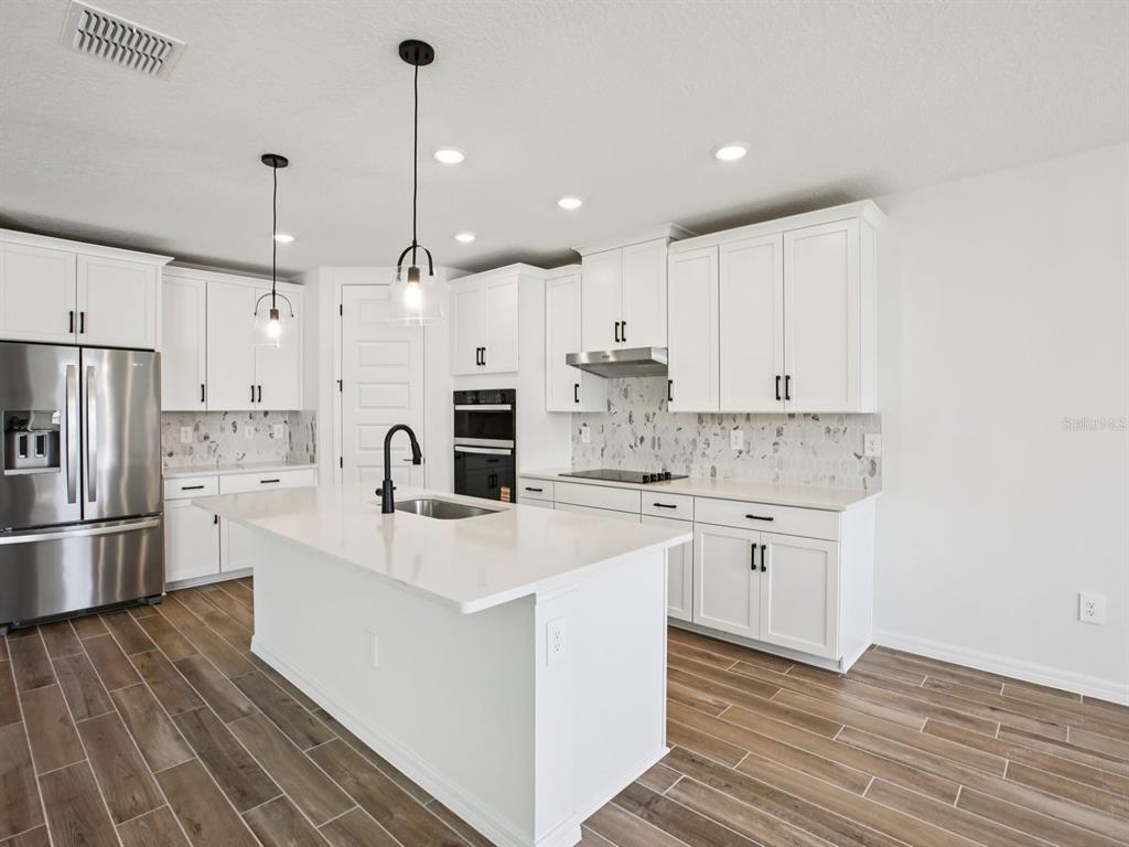 Photo is not of the actual home, but is an inspirational photo of builder’s model home and may depict options, furnishings, and/or decorator features that are not included