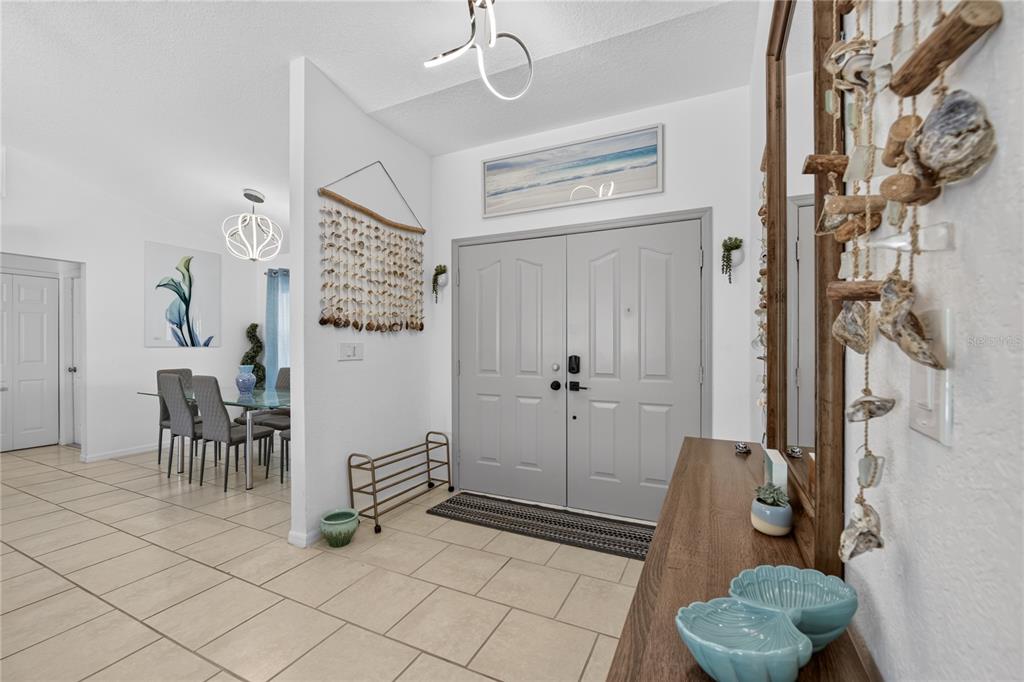 Entryway and formal dining area.