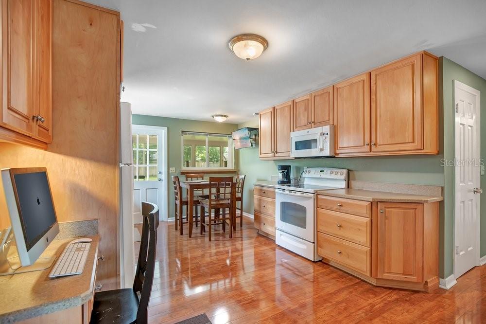 Kitchen, solid wood cabinetry, eat in space