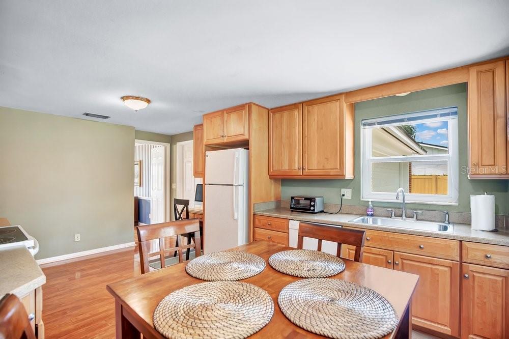 Kitchen, solid wood cabinetry, eat in space