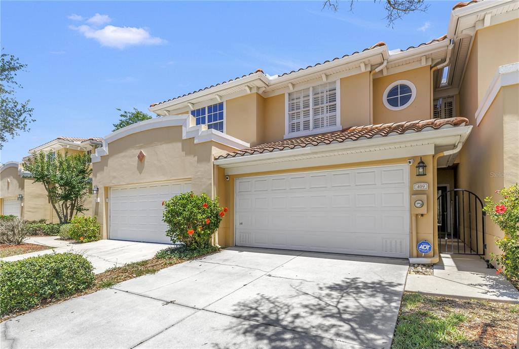 409 Barcelona - attached 2 car garage with private courtyard & gated entry