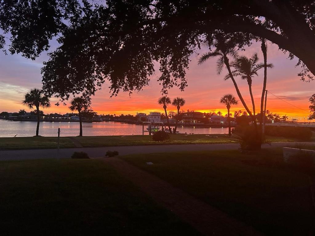Sunset on the water from the front porch at 110 Sunset Dr S!!