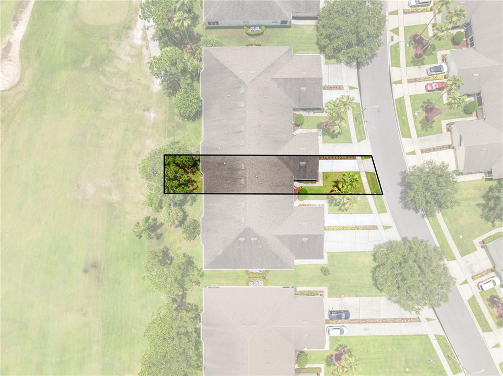 Unshaded area is 153 Club Villas with a view of the golf course from the rear lanai.