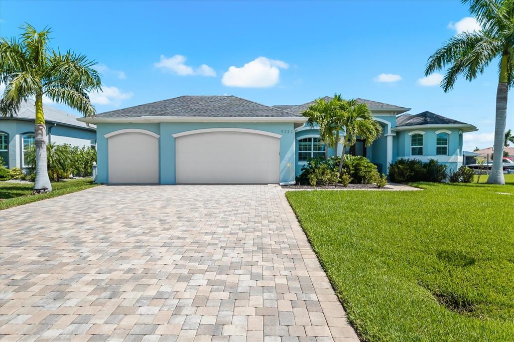 Impressive THREE-Car Garage!