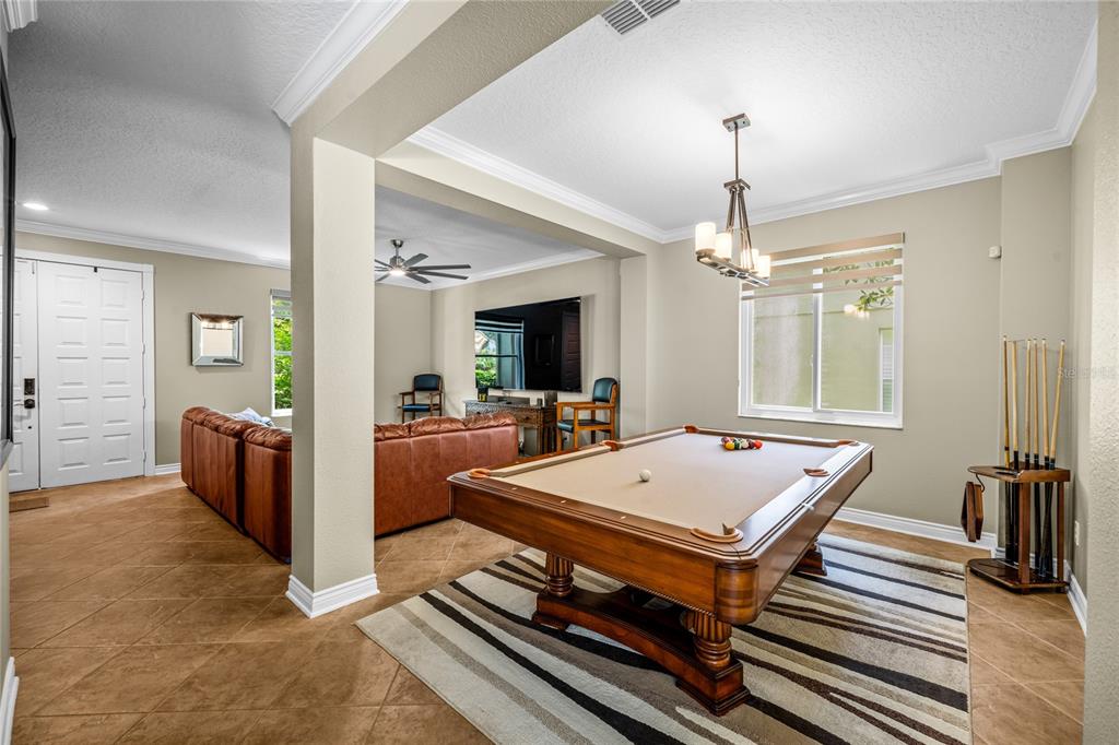 As you enter  you will find the formal living room & dining area.
