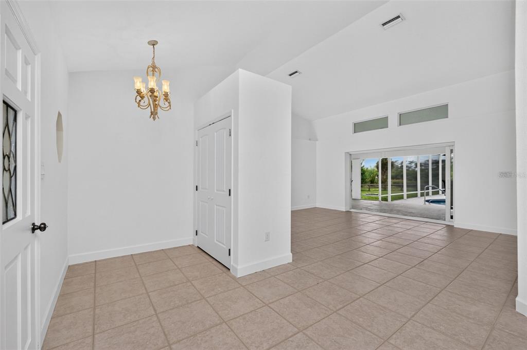 There's a small nook and coat closet to the left of the entrance door