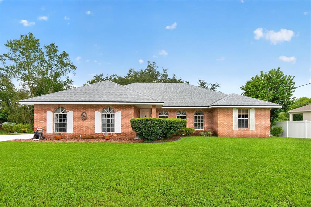 Meticulously maintained and full of inviting spaces, this CHARMING 3-Bedroom, 2-Bath home offers comfortable Florida living on an OVERSIZED LOT with mature trees.