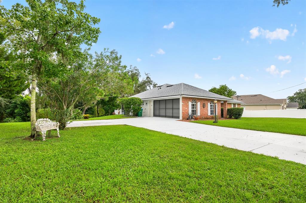 Situated in a HIGH AND DRY LOCATION, the home boasts GREAT CURB APPEAL with attractive brick facing.