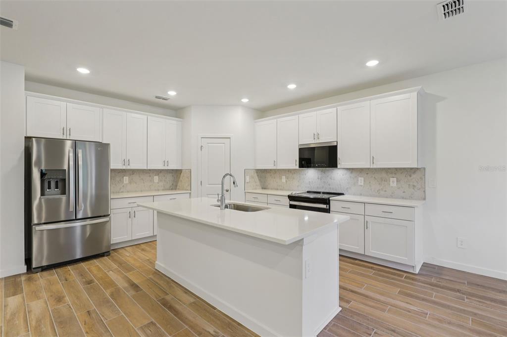 The interior photos are of another home with the same floor plan and interior finishes. Some details may vary