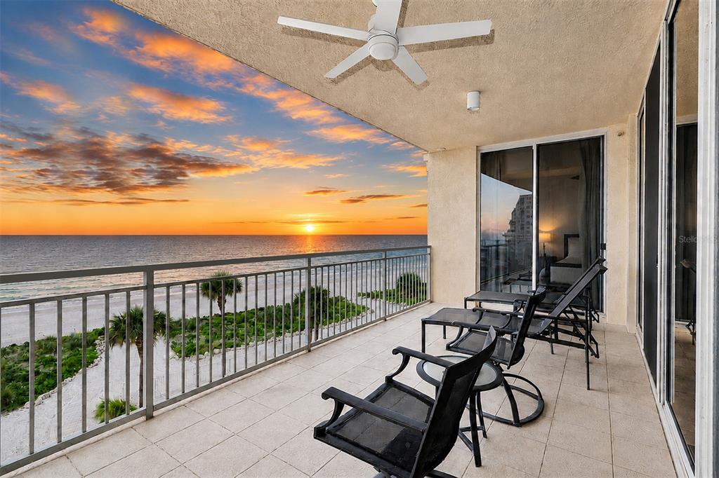 .. Twilights Shots of the Sereno. The Architectural Arc of the Complex Affords the Units with Long Range Gulf Water Views. Residence 404 is Sitting  Right in the Center in the Cat's Seat. .