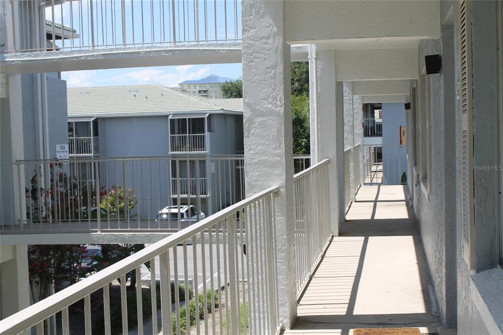 Covered walk way stairs to unit