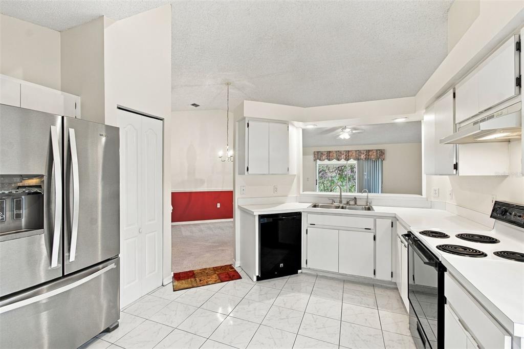 Modern kitchen featuring an open-concept layout with a view of the living area.