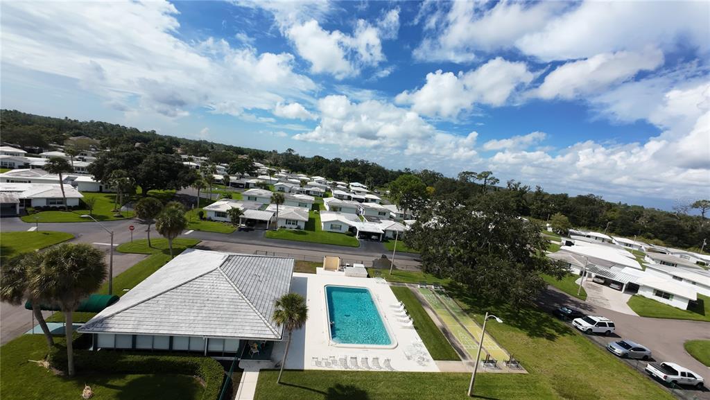 Community pool, recreation hall, and shuffle board court