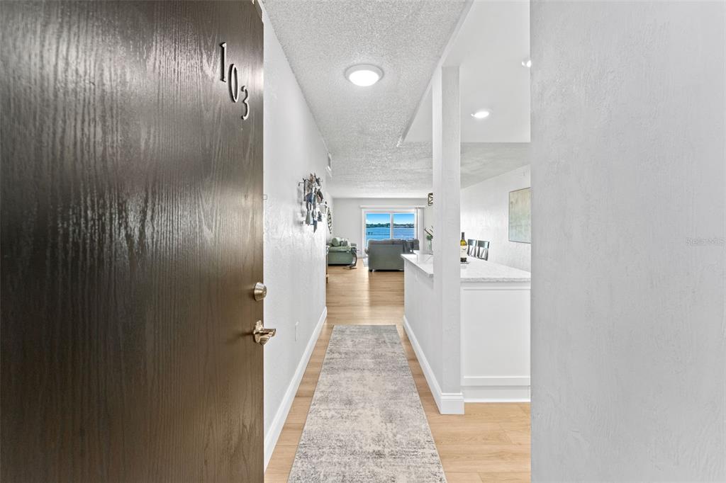 Welcome & come on in to unit #103- no elevators or stairs needed.