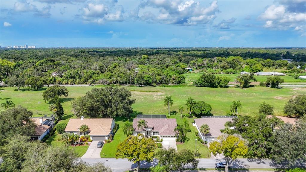 Birds eye view of golf course backyard.