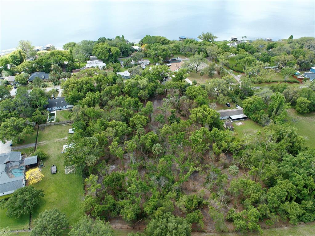 Aerial view from back of property.. Lake Ola in background