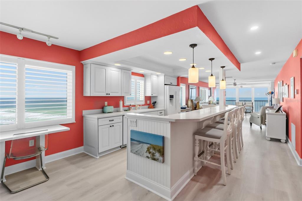 View as your enter the condo looking at kitchen, family room in the rear, and then your lanai.