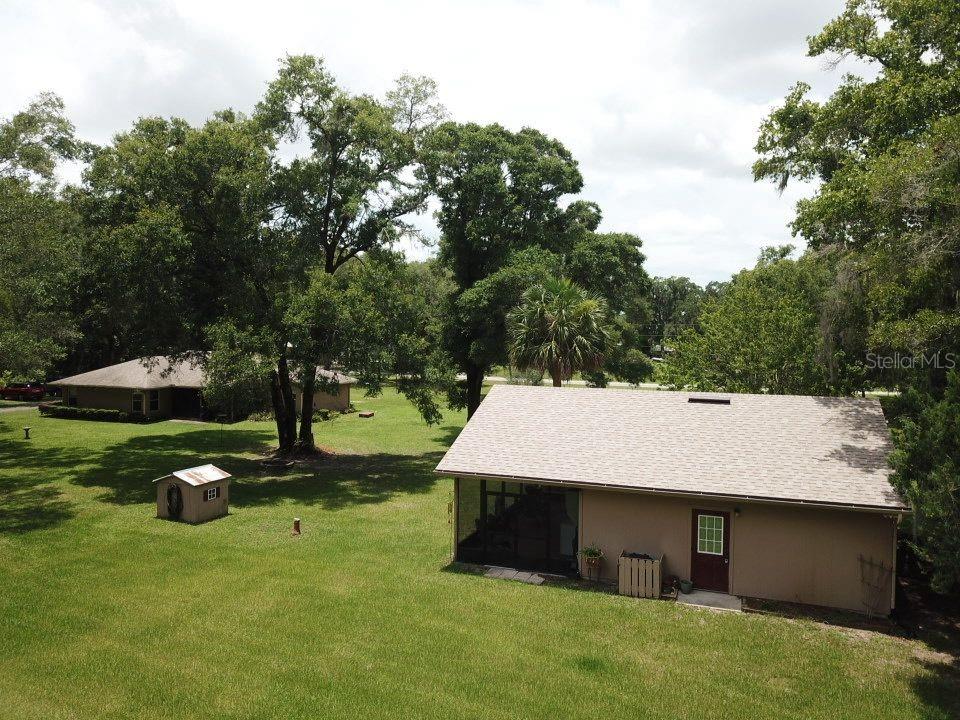 Drone shot of GUEST house and main house behind it