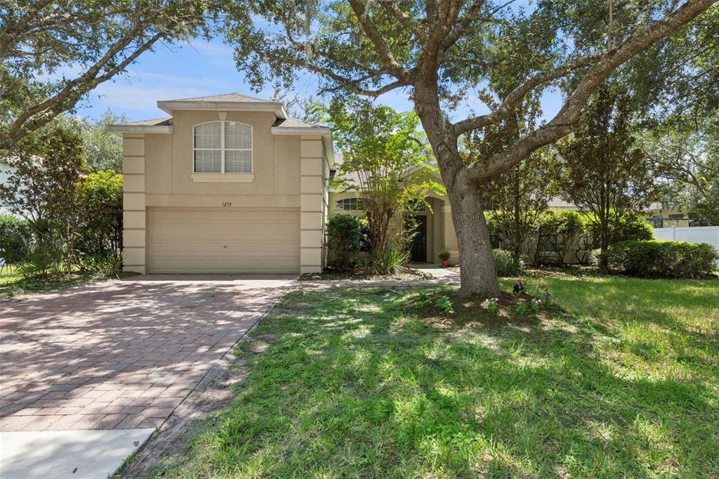 large driveway and 2 car garage