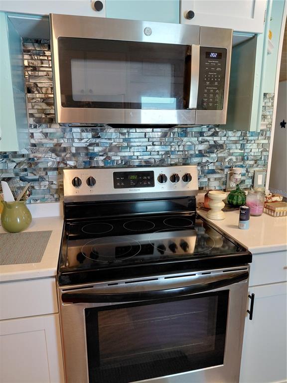 fully equipped with appliances, lots of storage & designer backplash