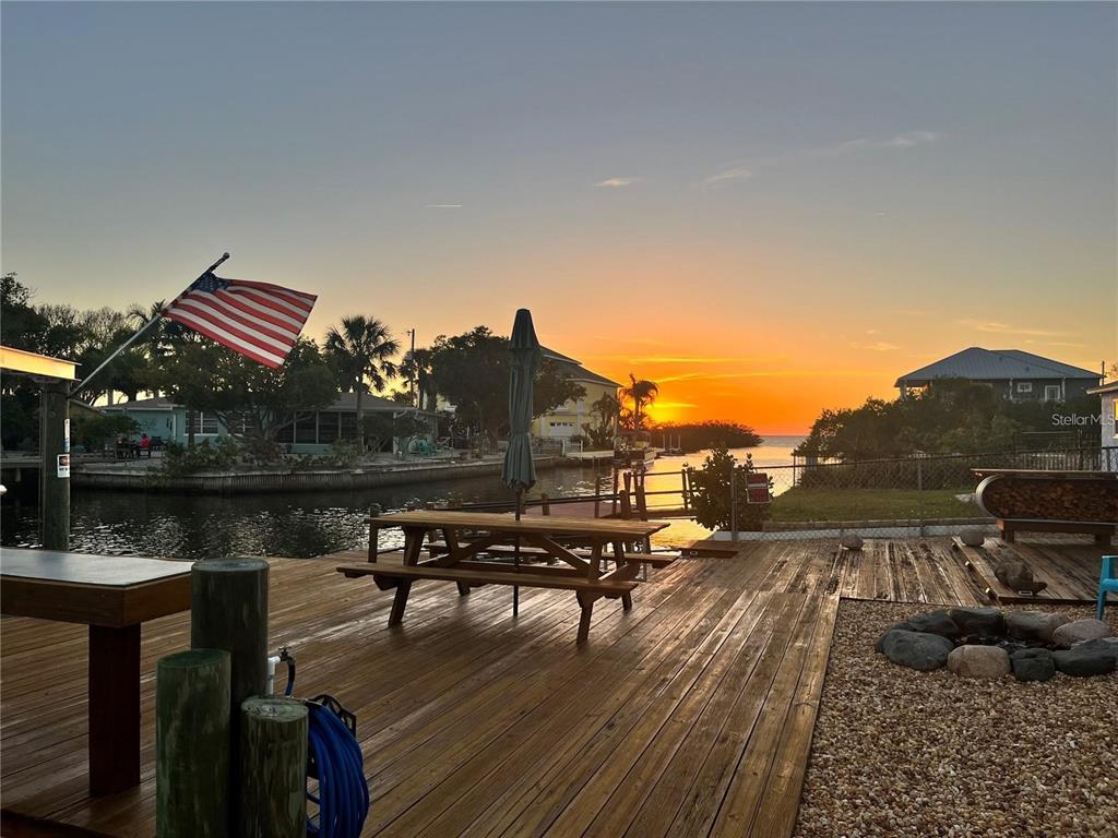 Enjoy your front row seat to exceptional vibrant watercolor sunsets over the Gulf waters in this amazing home..
