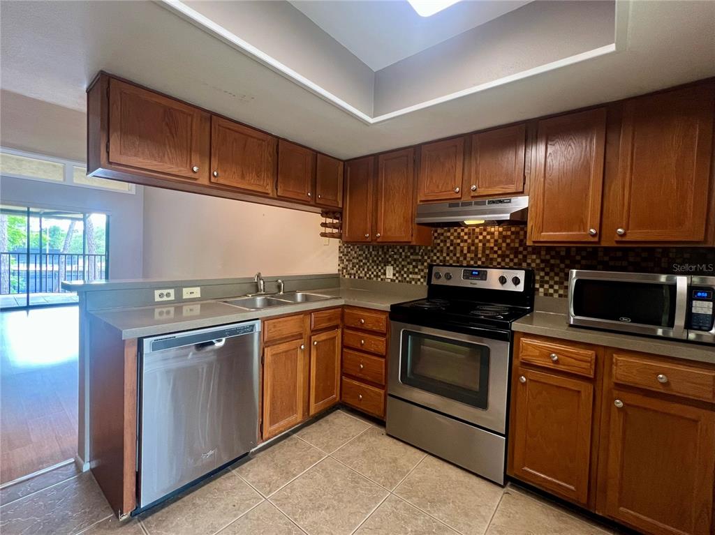 Property for sale at 142 WOODLAKE WYNDE UNIT 48, OLDSMAR, FL, 34677