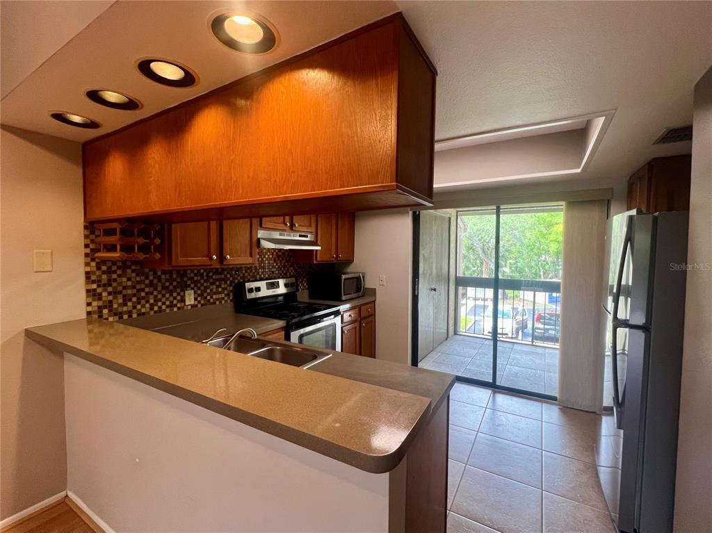 Property for sale at 142 WOODLAKE WYNDE UNIT 48, OLDSMAR, FL, 34677