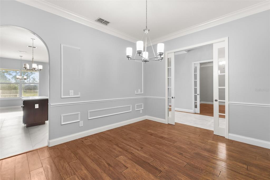 Dining room with pocket doors & direct access to kitchen