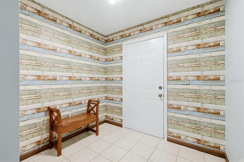 Foyer with spacious closet.