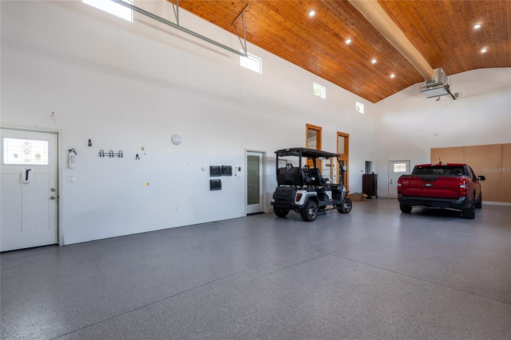 RV Garage with entry doors to the 2 car garage and the cottage