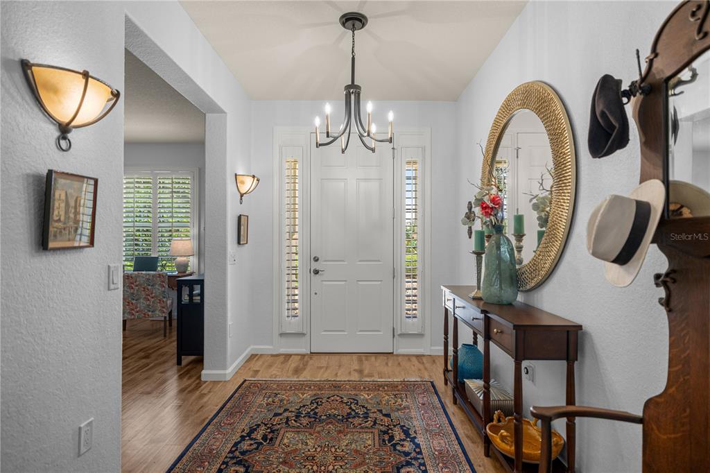 This entry way gives you a glimpse of the home without feeling like you're walking right into all of the living space at once