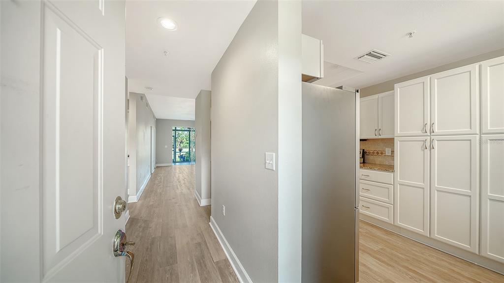 ENTRANCE HALL & KITCHEN.