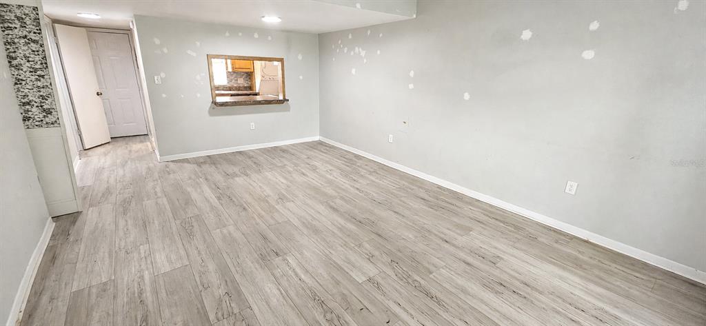 Living room welcomes you in from the outside living space
