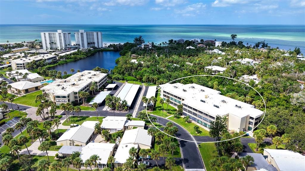 Aerial view of the Gulf front property of Whispering Sands! 225 Hourglass Way is circled.