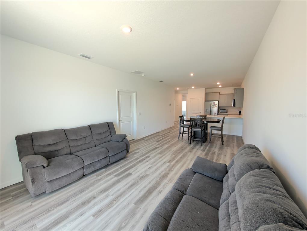 Great Room, Kitchen, Primary Bedroom door.