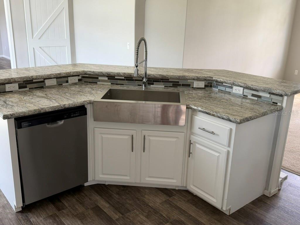 Kitchen with farm sink