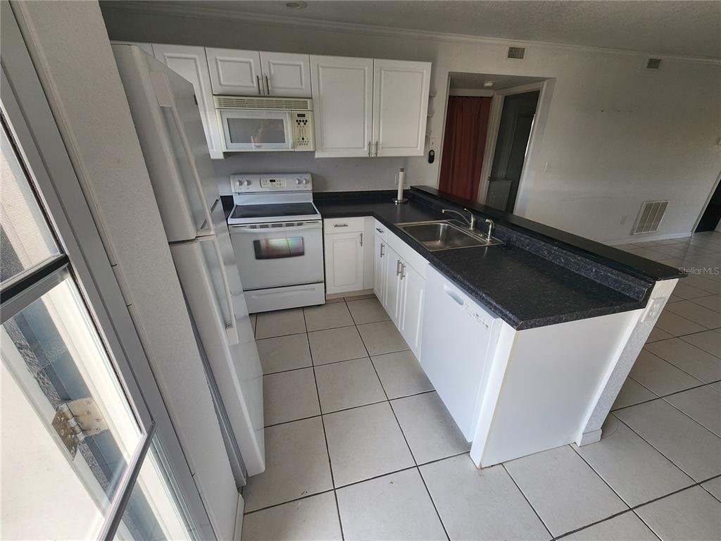 Property for sale at 25050 SANDHILL BOULEVARD UNIT B1, PUNTA GORDA, FL, 33983