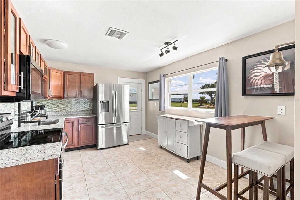 Granite Countertops, Stainless Steel Appliances & Plenty of Cabinet Storage