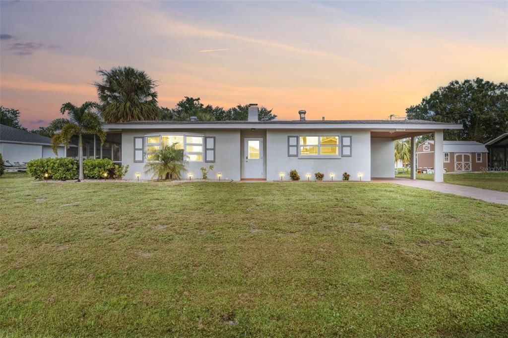 Charming Waterfront Home with Expansive Front Yard