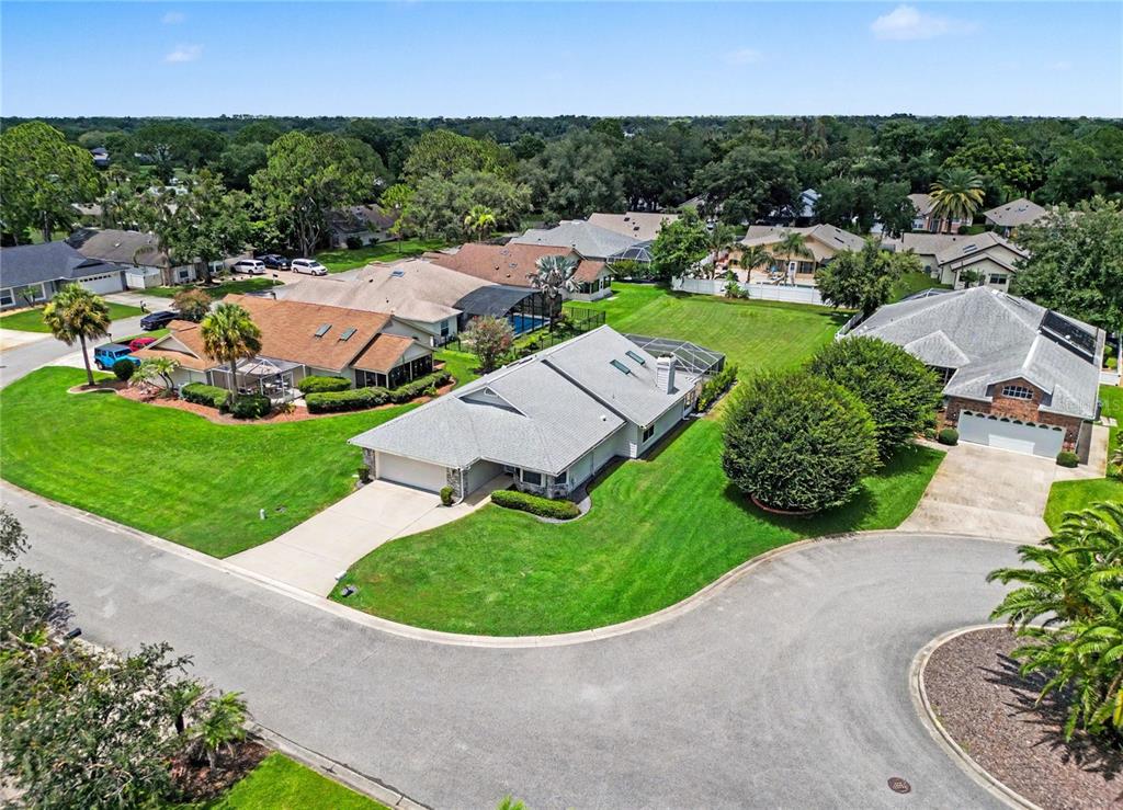 Ideally situated on a cul-de-sac, this lovely home offers lovely pond views from the front yard