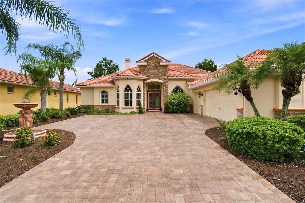 Extensive landscaping and gorgeous tile roof