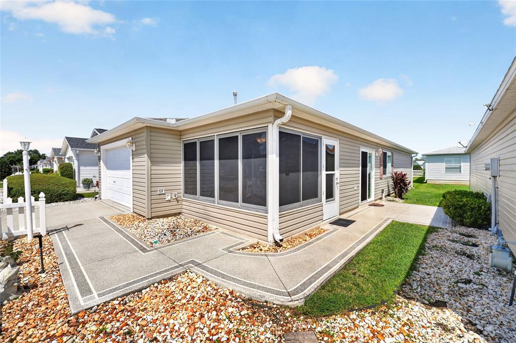 8214 SE 169th Palownia Loop. You will appreciate the beautifully painted drive and sidewalks and patio.