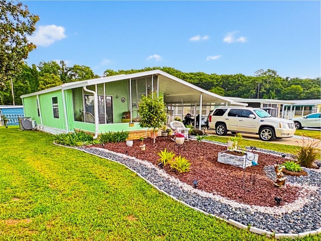 Property for sale at 413 S TIMBER TRAIL, WILDWOOD, FL, 34785