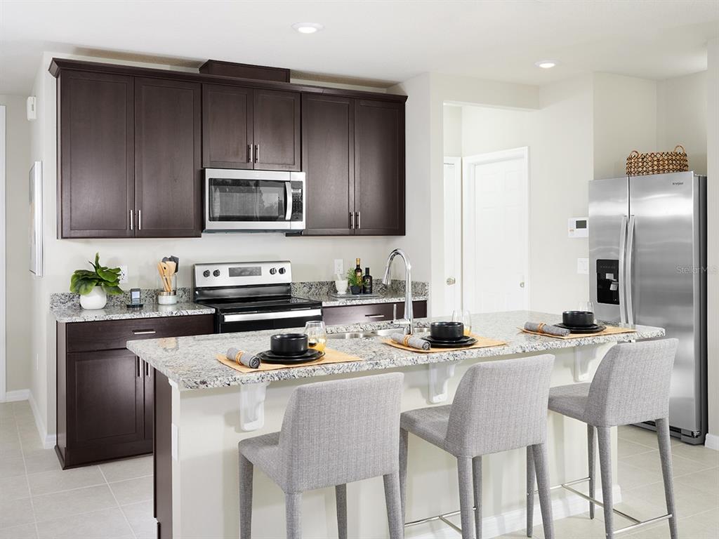 Photo is not of the actual home, but is an inspirational photo of builder’s model home and may depict options, furnishings, and/or decorator features that are not included.